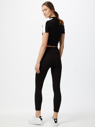 PUMA Skinny Sportovní kalhoty 'Classics' – černá