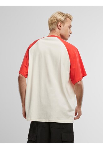 Karl Kani T-Shirt in Beige