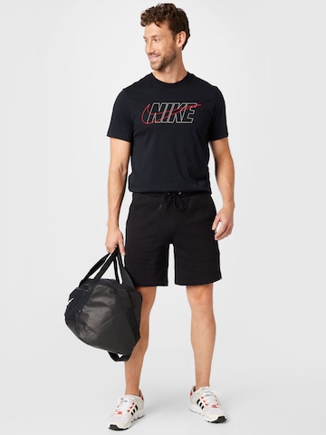 PUMA Regular Workout Pants 'Downtown' in Black
