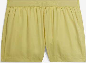 Calvin Klein Swimwear Board Shorts in Yellow: front