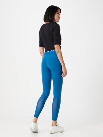 NIKE Skinny Sportovní kalhoty – modrá