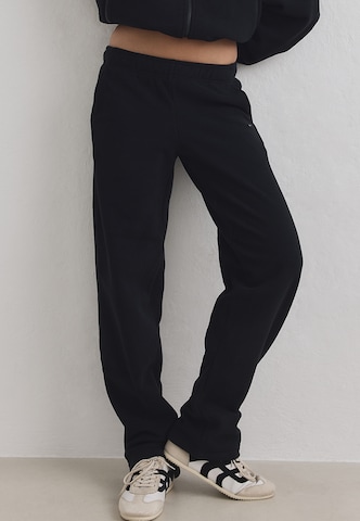 Aim'n Loosefit Sporthose in Schwarz: Vorderseite