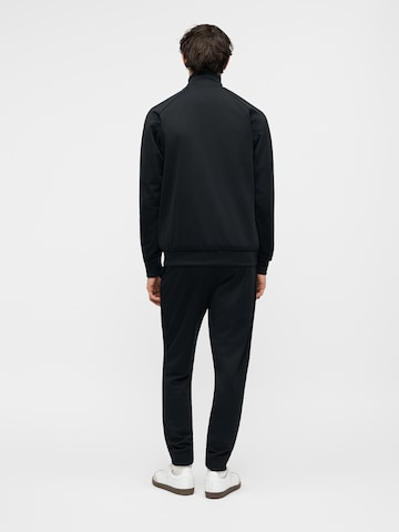 ADIDAS ORIGINALS Костюм для бега 'TECH ESS' в Черный