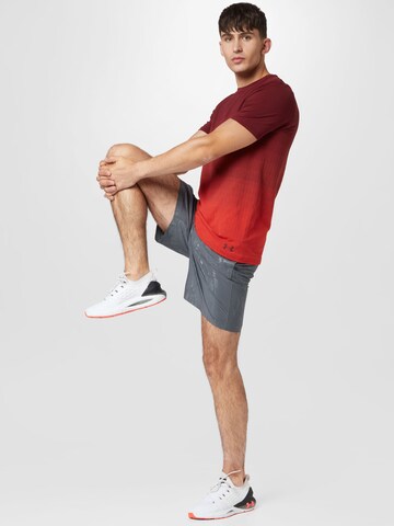 UNDER ARMOUR Regular Sportshorts 'Emboss' in Grau