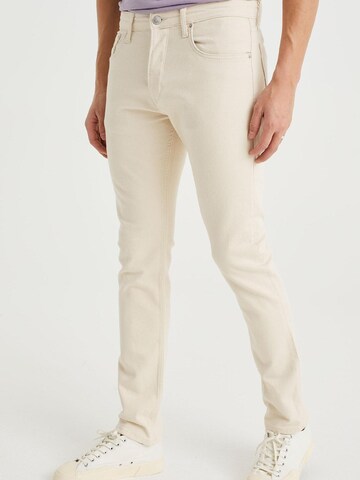 WE Fashion Slim fit Jeans in Beige