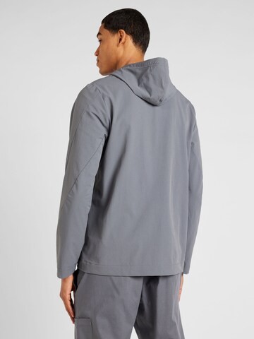 Reebok - Chaqueta de chándal en gris