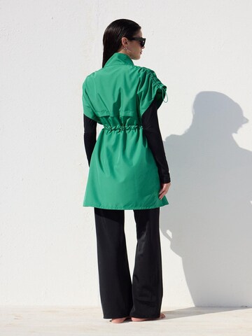 MANUKA Swimsuit dress in Green