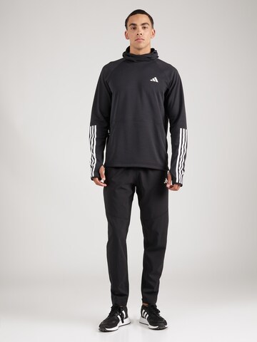 ADIDAS PERFORMANCE Tapered Workout Pants 'Own The Run' in Black