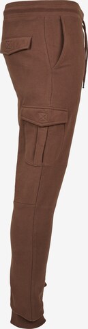 Tapered Pantaloni cu buzunare de la Urban Classics pe maro