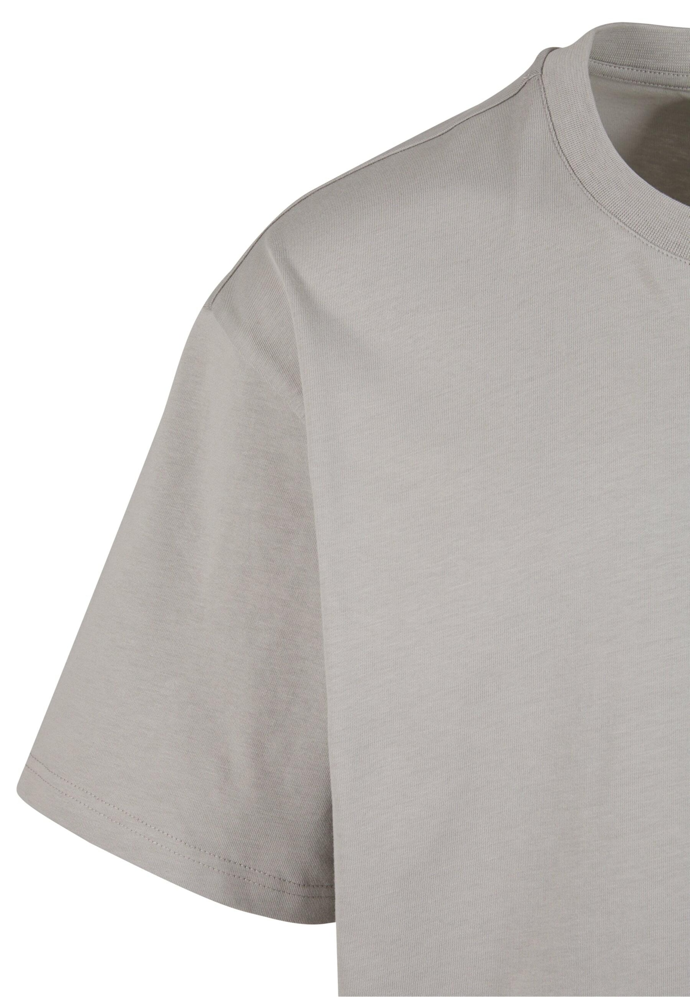 Maglietta 'Woven Signature Resist Love' di Karl Kani in grigio