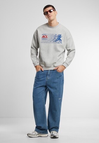 Felpa 'Athletics' di Another Cotton Lab in grigio