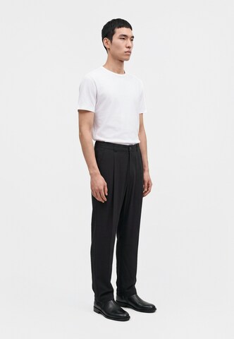 Slimfit Pantaloni cutați 'Fruet' de la Carlo Colucci pe negru