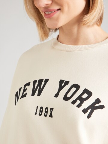 PIECES Tréning póló 'PCTAMY' - bézs