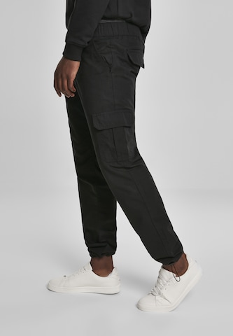 Regular Pantalon cargo Urban Classics en noir