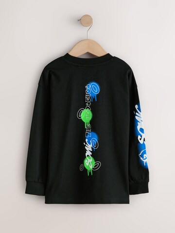 Tricou de la Next pe negru