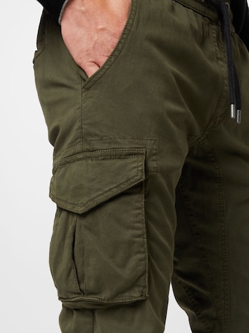 Tapered Pantaloni cargo di ALPHA INDUSTRIES in verde