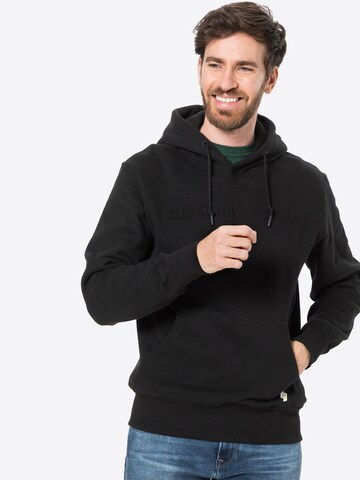 Coupe regular Sweat de sport Superdry en noir : devant