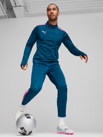 PUMA - Slimfit Calças de desporto 'TeamLIGA' em azul