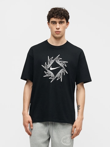 T-Shirt Nike Sportswear en noir : devant