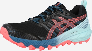 Chaussure de course 'Trabuco' ASICS en noir : devant