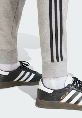 ADIDAS ORIGINALS Tapered Trousers in Grey