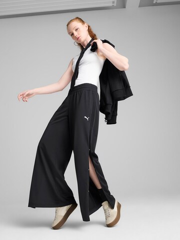 PUMA Wide leg Sports trousers 'Wardrobe Ess' in Black