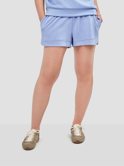 Gisela Calças ' ' em azul, Vista do artigo