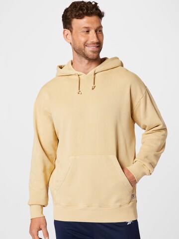 Sweat-shirt Reebok en beige : devant