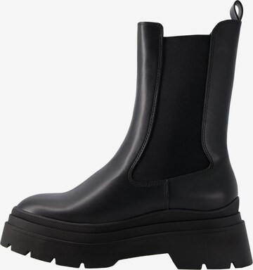 Bershka Chelsea boots in Zwart