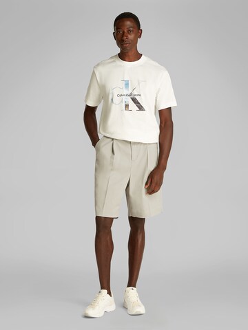 Regular Pantalon à plis Calvin Klein Jeans en gris