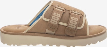 UGG Klapki 'GOLDENCOAST STRAP SLIDE SAND/SANTORINI' w kolorze beżowy: przód