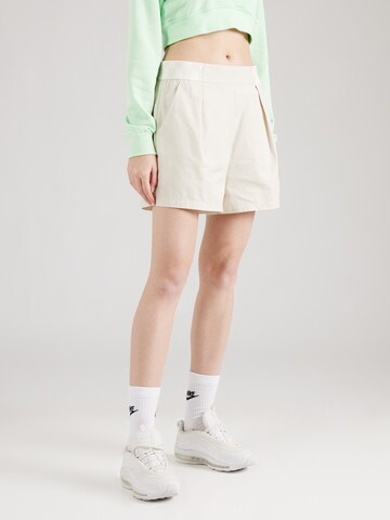 regular Pantaloni con pieghe di Nike Sportswear in beige: frontale