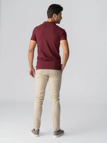 Coupe regular Chemise ' Muscle Polo ' TEESHOPPEN en rouge
