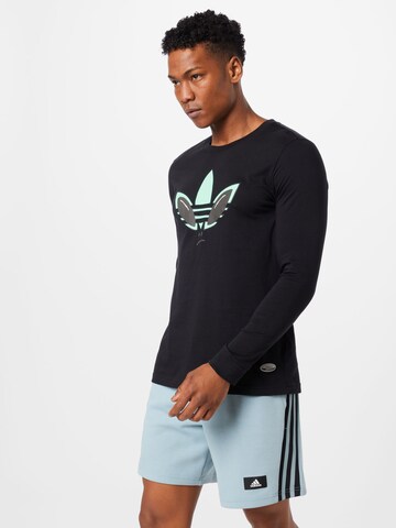 ADIDAS ORIGINALS Sweatshirt 'Q1 LS' in Black: front