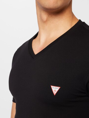 Tricou de la GUESS pe negru