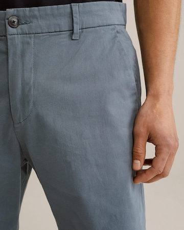 WE Fashion - Regular Calças chino em azul