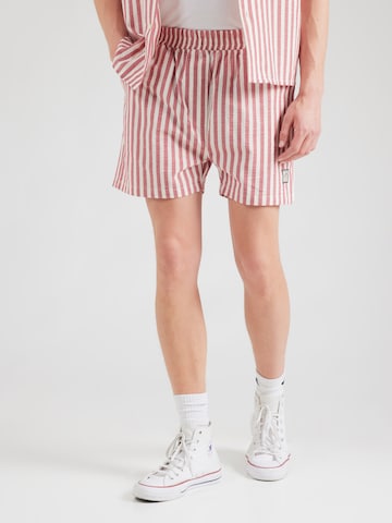 Kaotiko Regular Trousers in Red: front