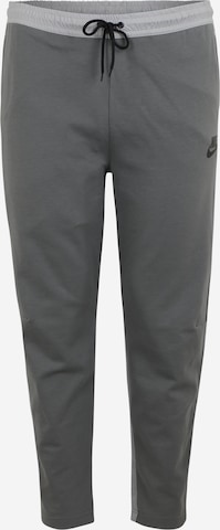 Nike Sportswear - Tapered Calças em cinzento: frente