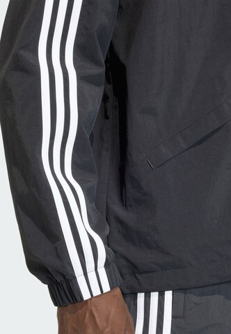 ADIDAS ORIGINALS Between-season jacket in Black