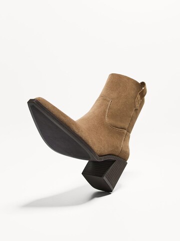 Bershka Kovbojské boty – béžová