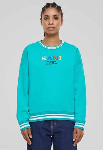 Sweat-shirt 'Retro College' Karl Kani en bleu : devant