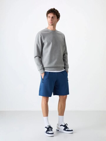 Tommy Life Regular Trousers in Blue