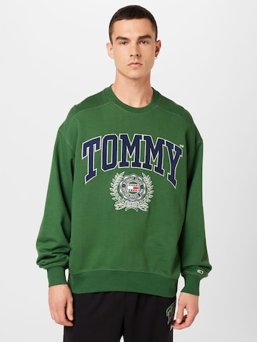 Tommy Jeans كنزة رياضية بلون أخضر: الأمام