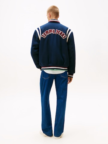 Tommy Jeans Overgangsjakke 'BEST VARSITY' i blå: forside
