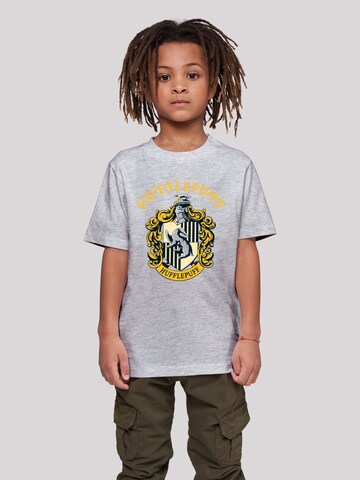 F4NT4STIC Shirt 'Harry Potter Hufflepuff Crest' in Grijs: voorkant
