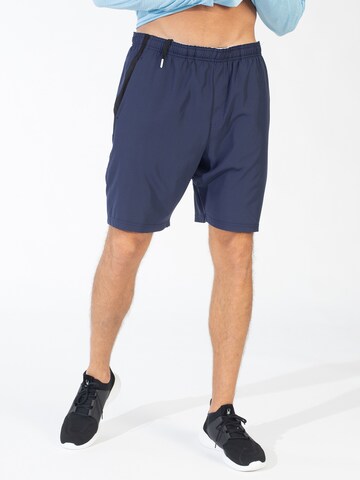 Regular Pantaloni sport de la Spyder pe albastru: față