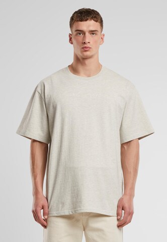 Karl Kani Autograph Heavy Jersey Boxy Melange Tee ' ' in Beige
