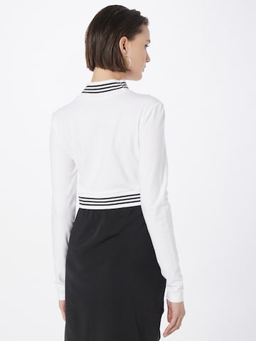 Maglietta 'Long-Sleeve Top With Ribbed Collar And Hem' di ADIDAS ORIGINALS in bianco