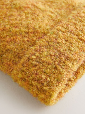 Next Pipo värissä keltainen