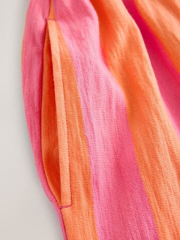 Next - Jumpsuit en naranja